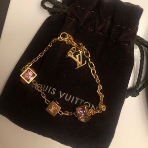 Louis Vuitton rose gold bracelet.